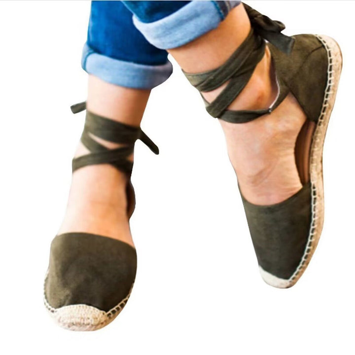 Stylish women's espadrille shoes with chic tie-straps. Perfect comfortable footwear for summer fashion.