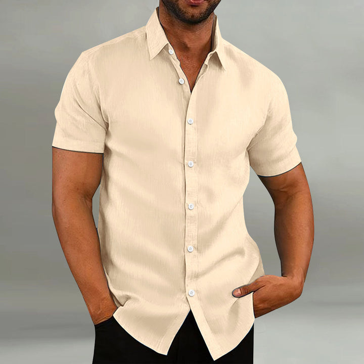 Close-up of the button placket on a men's stylish short sleeve casual leisure shirt, quality detail.
