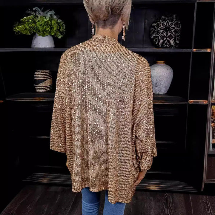 Versatile women's sequin cardigan, a sparkling loose fit jacket for stylish party wear.
