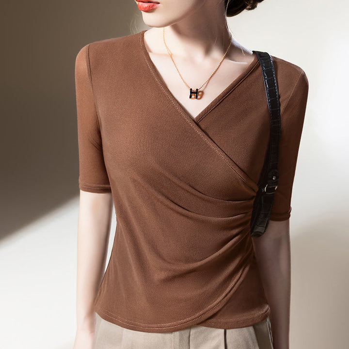 Stylish draped V-neck wrap top for women. Half sleeves & elegant fit for office wear or casual chic.