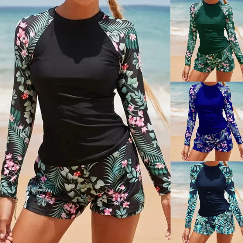 Women's UV protection long sleeve swimsuit with chic leaf print for sun safety and style.