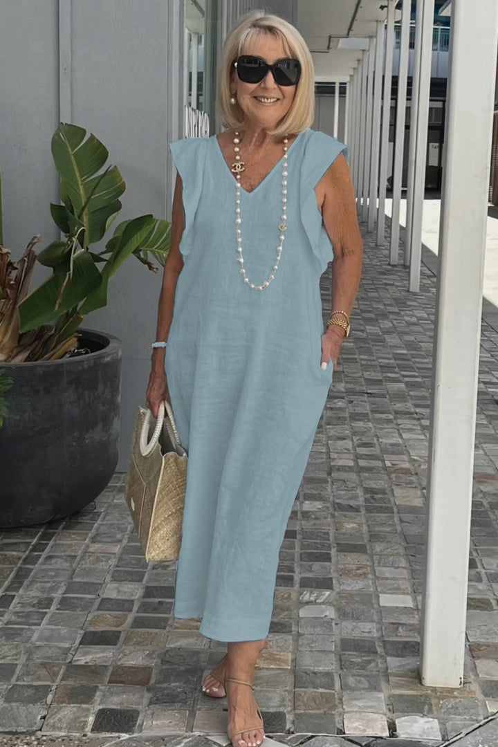 Women's elegant sleeveless summer dress, a chic flowy V-neck maxi style perfect for any occasion.