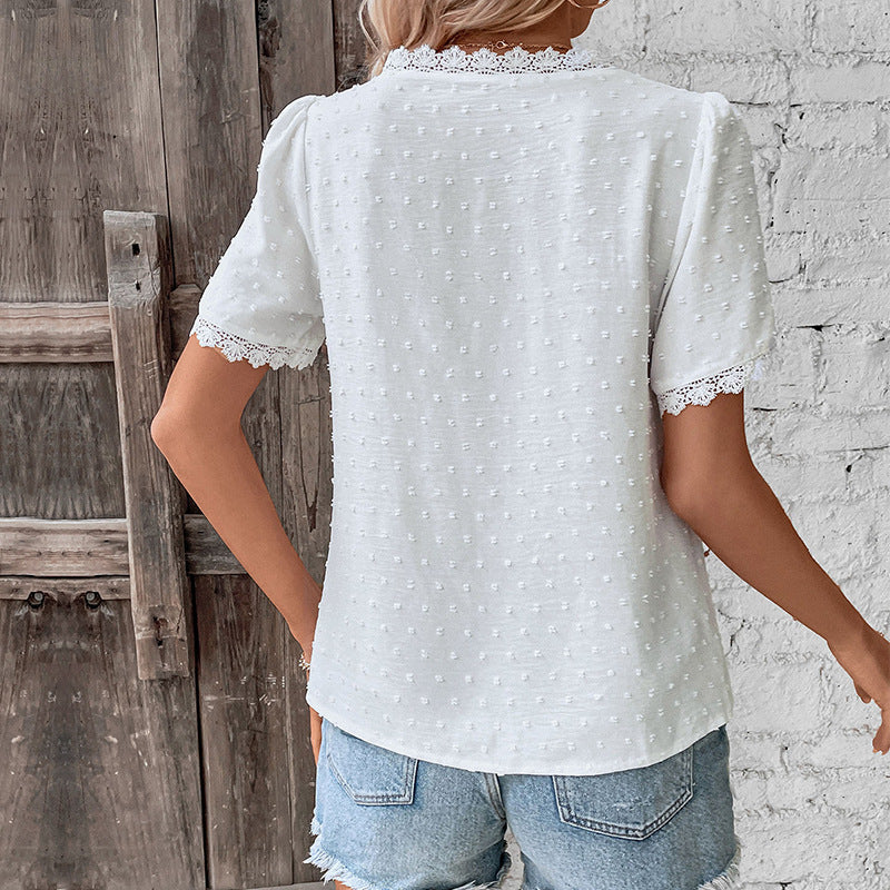Women's short sleeve V-neck blouse featuring intricate lace details, summer-ready style.