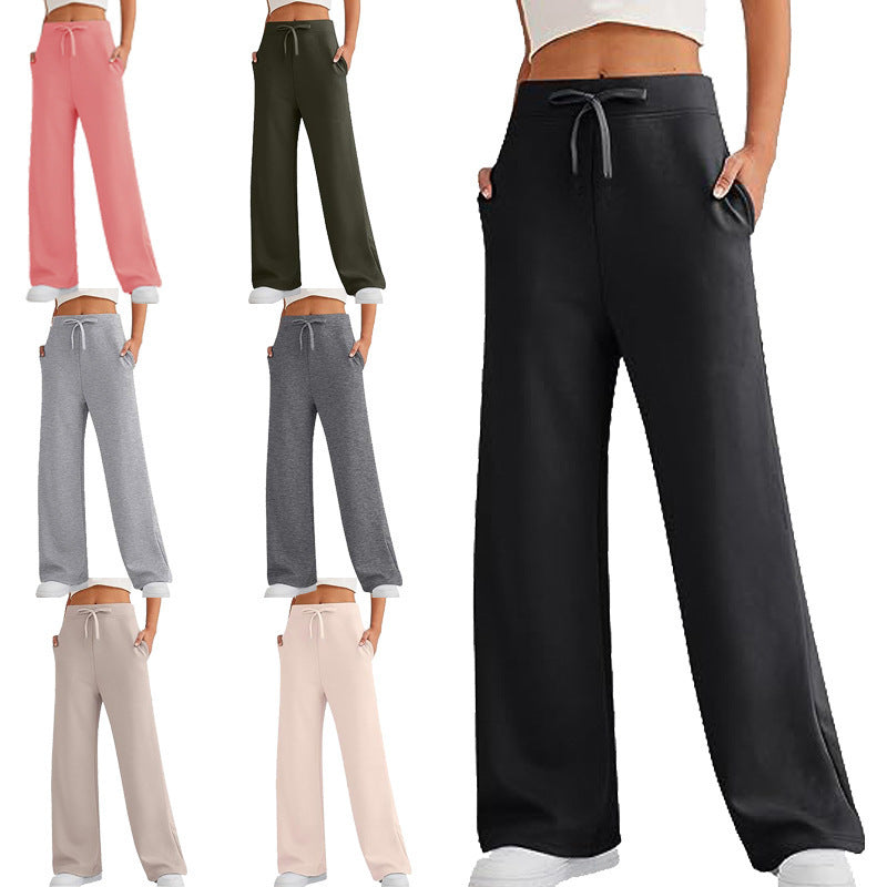 Women's relaxed fit lounge pants with convenient pockets, comfortable for home wear & casual style.