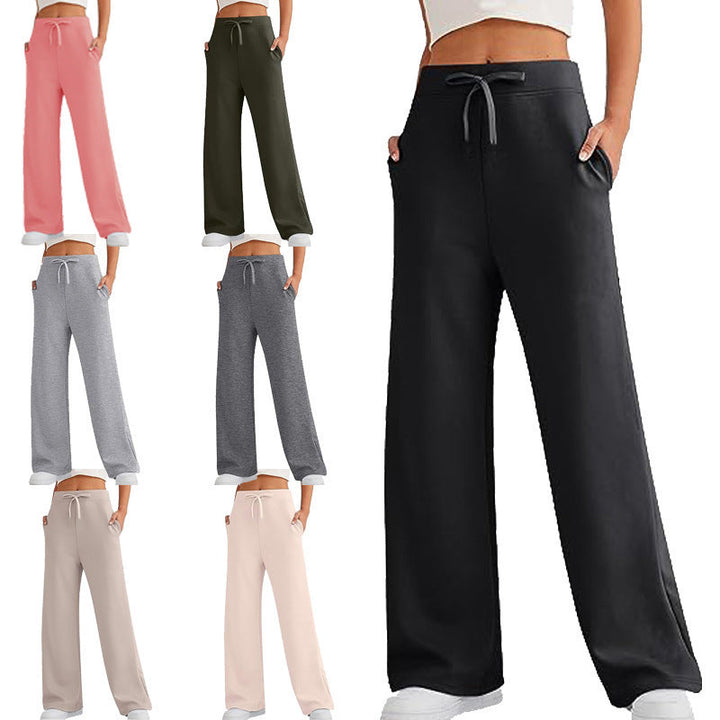 Women's relaxed fit lounge pants with convenient pockets, comfortable for home wear & casual style.