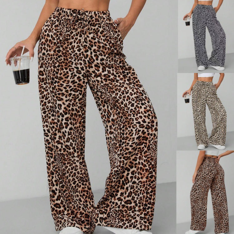Women's loose fit wide leg pattern pants with an elastic waist for comfort & style.