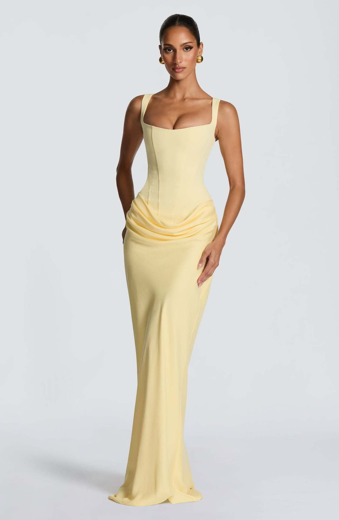 Stylish black bodycon evening dress for women, figure-hugging and sleek with a square neckline, ideal for cocktail parties.