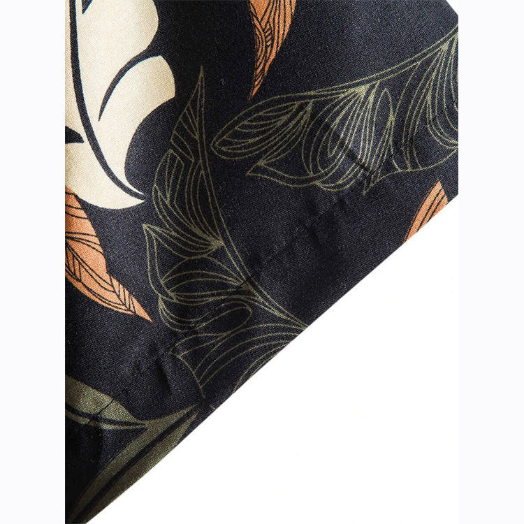 Stylish men's short-sleeve shirt featuring a unique floral print. Perfect button-down for modern casual wear.