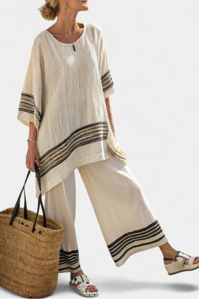 Women's elegant striped top & flowing pants matching set. Perfect for resort wear, summer, and vacation style.