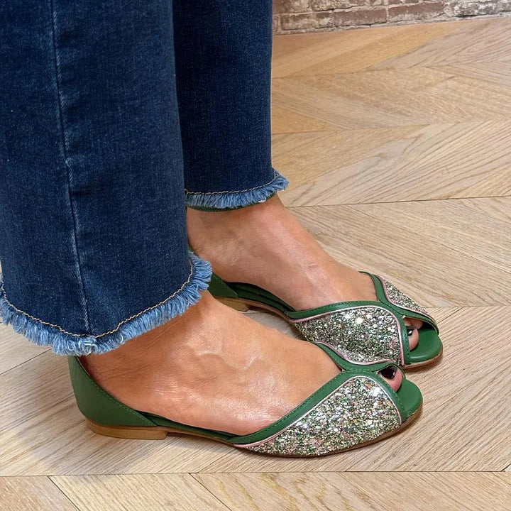 Versatile women's flat ankle strap sandals, offering comfortable elegance for any summer occasion.
