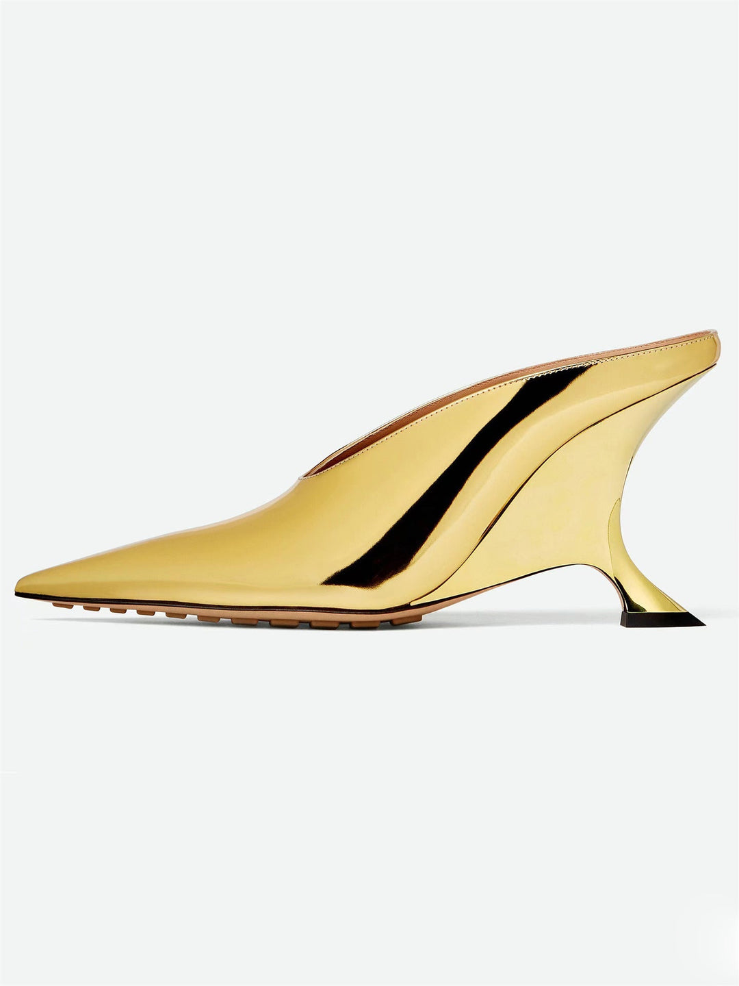 Women's metallic pointed toe wedge mules with a distinctive sculpted heel, great for dressy occasions.