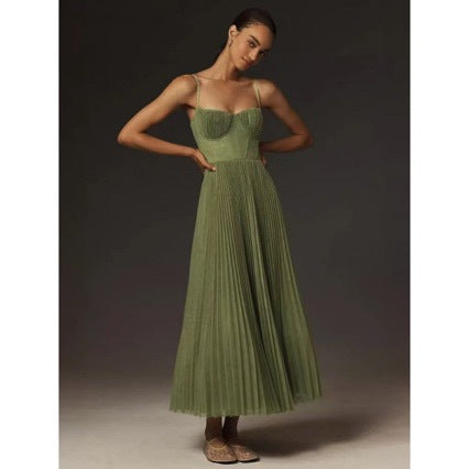 Stylish women's bustier maxi dress featuring a pleated skirt and flowing silhouette for parties & formal events.