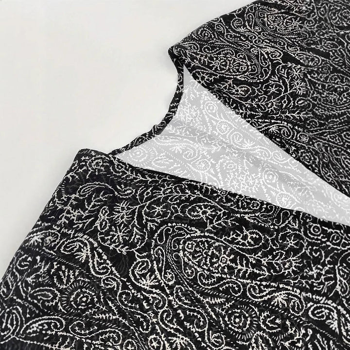 Lightweight women's kimono jacket with an eye-catching pattern. Ideal for resort wear or an elegant wrap.