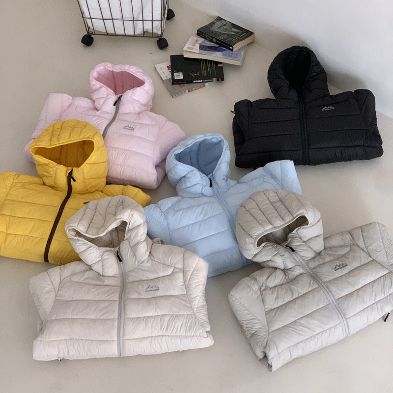 Easy-to-pack ultralight women's puffer jacket with removable hood, essential for travel & outdoor.