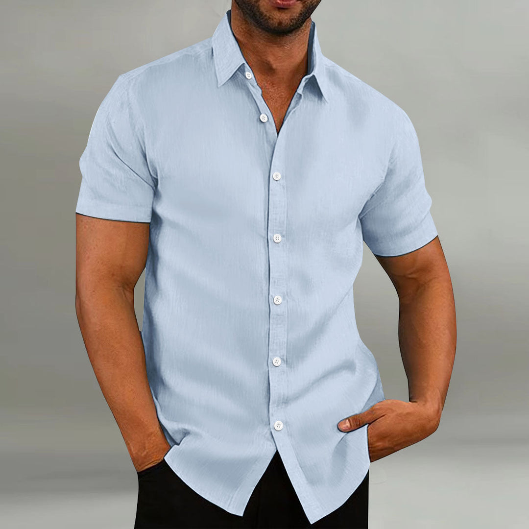 Men's short sleeve leisure shirt with button placket, offering casual comfort and stylish versatility.