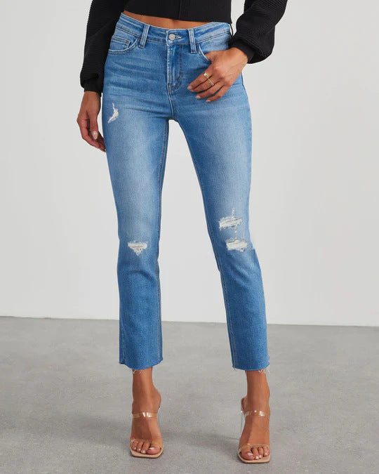 Ladies' trendy high-waisted cropped jeans, modern fit, comfortable for versatile wear.