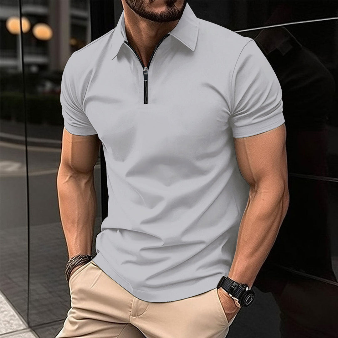Men's versatile performance zip polo in a classic color, perfect for casual or active fashion.