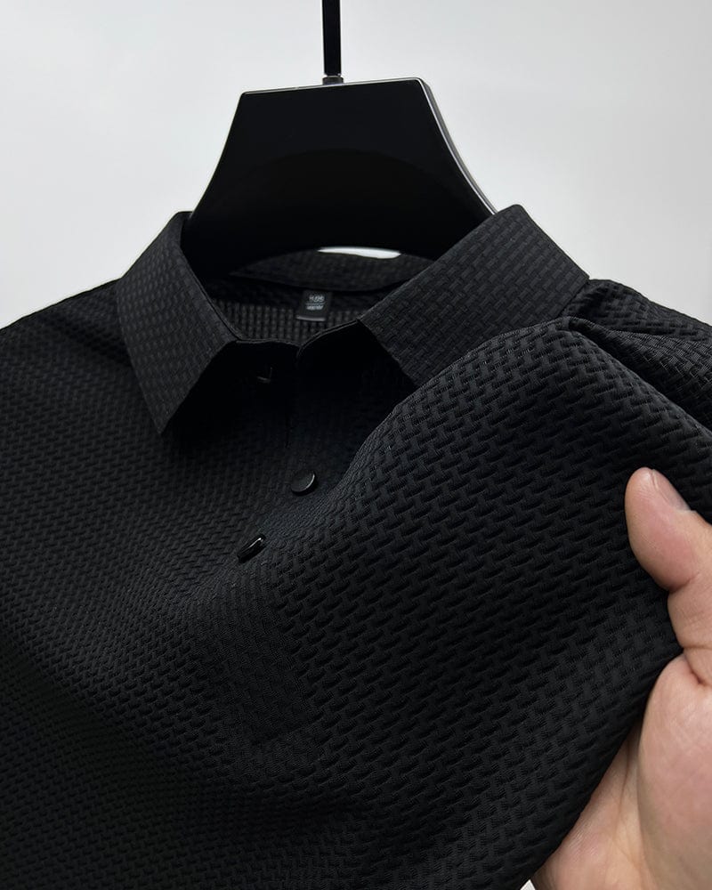 Man wearing a stylish, breathable short sleeve button-up polo, enjoying summer comfort.