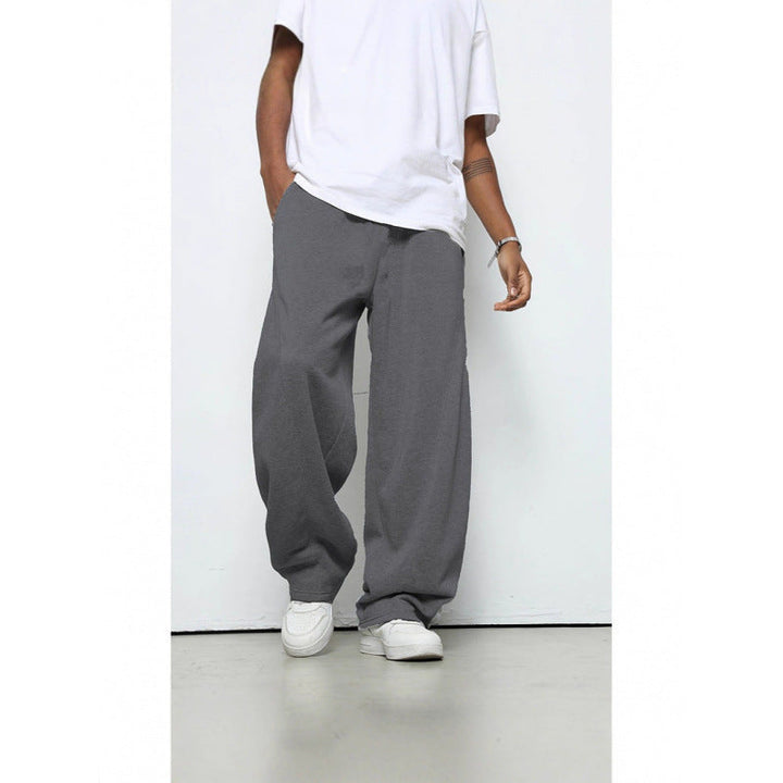 Men's relaxed fit jogging pants, suitable for gym workouts, running, or versatile everyday comfort.