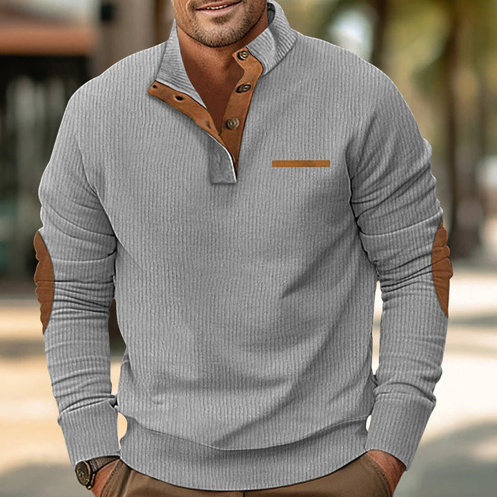 Stylish men's zip front sweater, black knit, sleek faux leather trim, urban fashion statement.