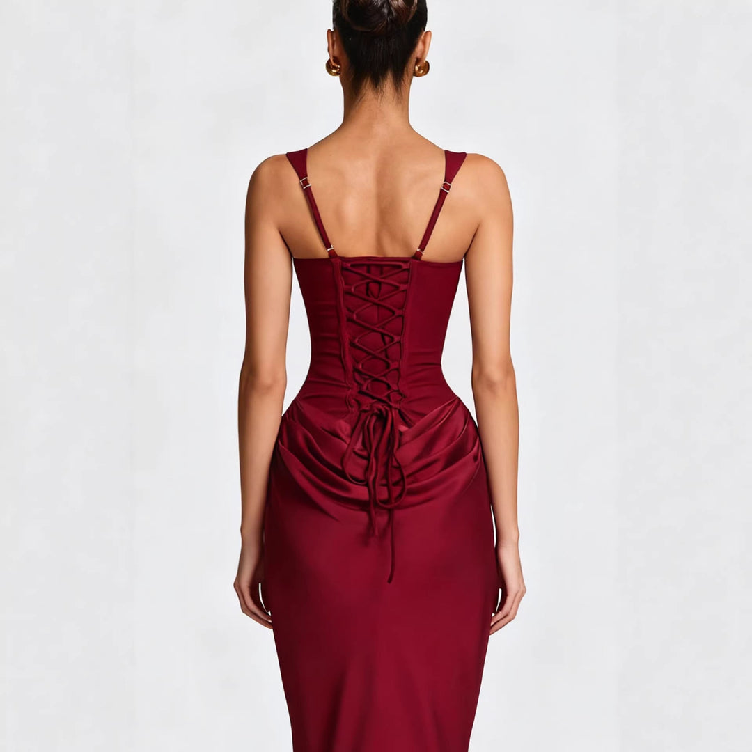 Women's elegant black formal dress, figure-hugging design showcasing a sleek side silhouette, great for evening wear.