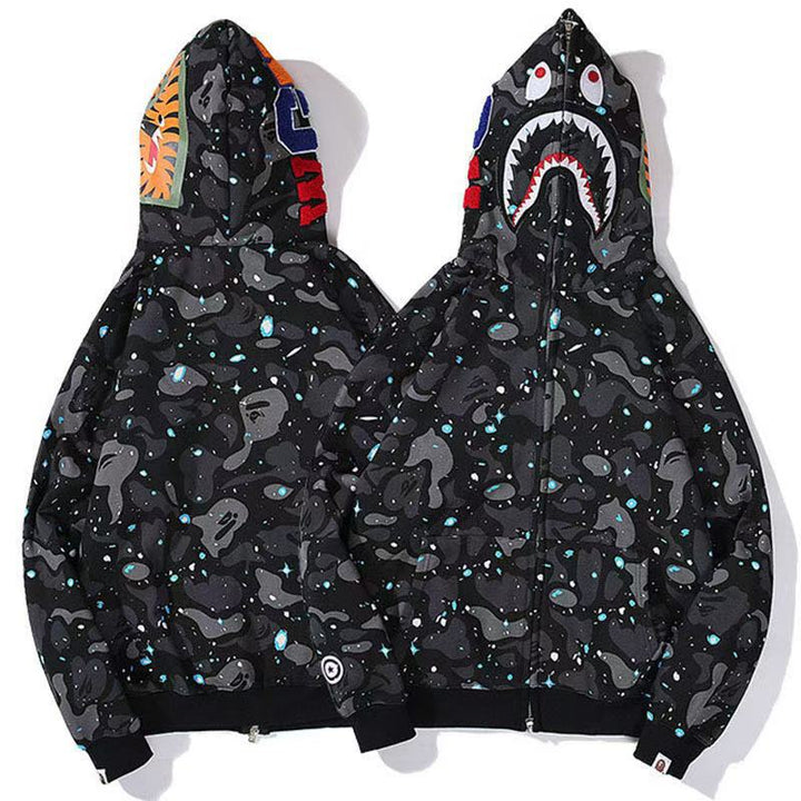 Back view of women's camouflage hooded sweatshirt. Casual fashion pullover, comfortable and trendy.