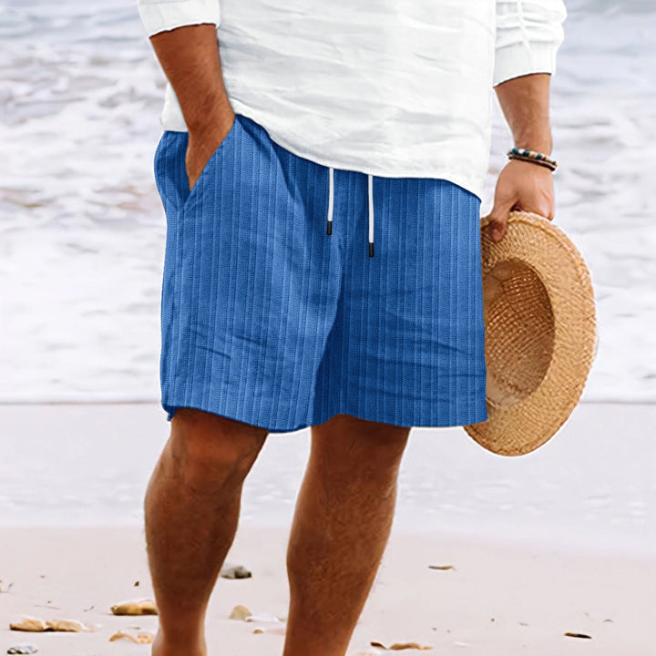 Stylish men's relaxed fit drawstring shorts, offering comfort & practicality for warm weather.