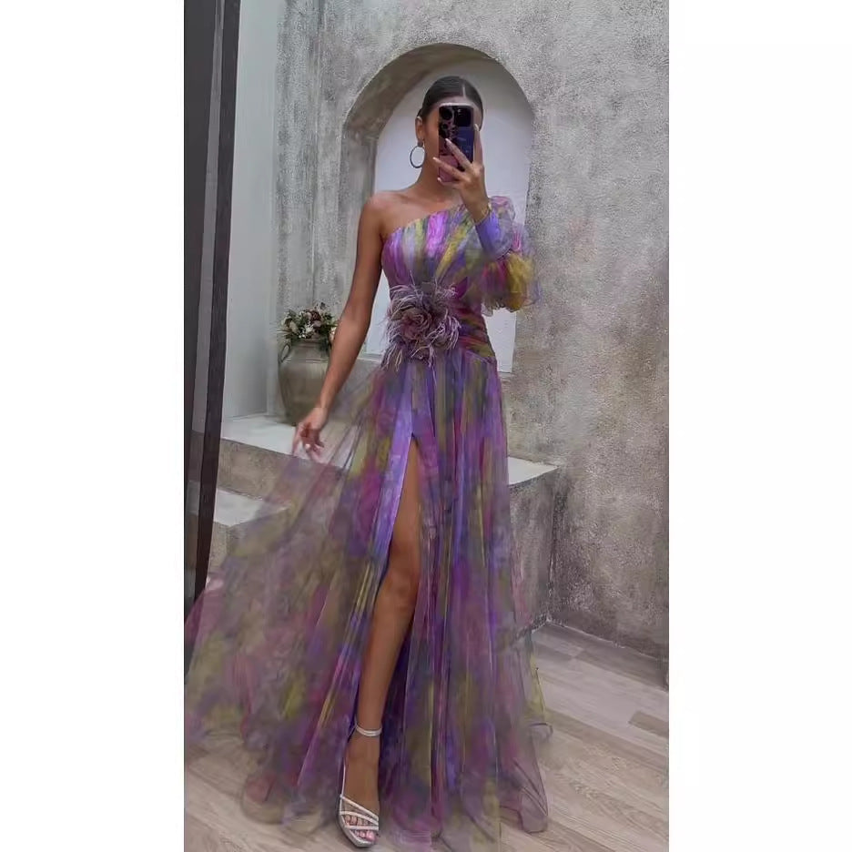 Chic women's evening dress with flowing fabric, elegant one-shoulder cut & unique asymmetric floral details.
