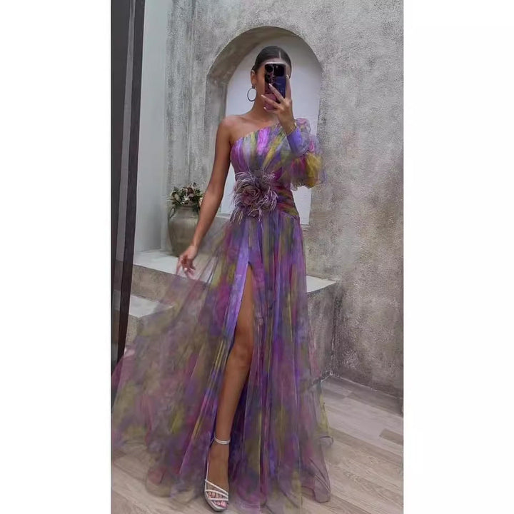 Chic women's evening dress with flowing fabric, elegant one-shoulder cut & unique asymmetric floral details.