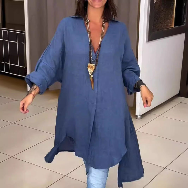 Elegant women's casual blouse, a versatile button-down shirt with roll-up sleeves in a relaxed fit.