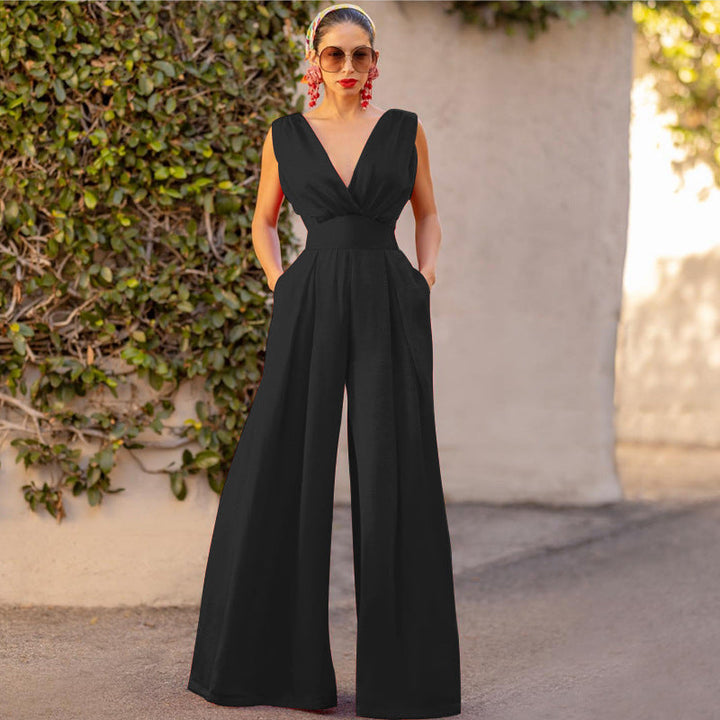 One-piece women's V-neck jumpsuit with a wide leg silhouette, offering effortless and elegant style.