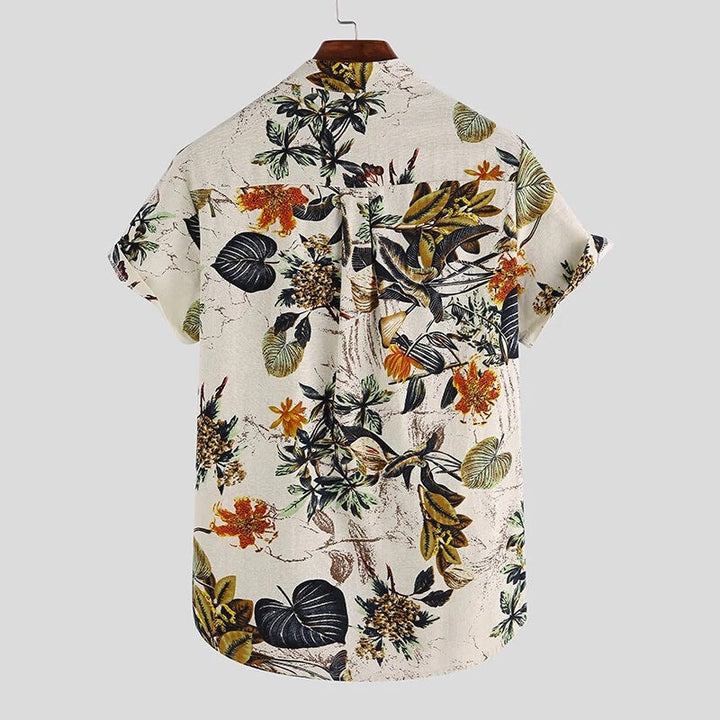 Relaxed fit men's floral henley shirt with button placket, ideal for beachwear or vacation.