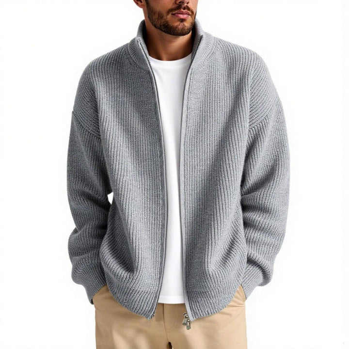 Essential men's high collar zipper cardigan for a comfortable fall outfit, combining warmth with modern style.