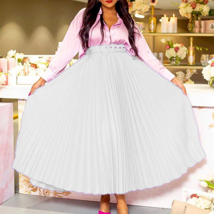 Stylish women's mid-length pleated skirt featuring a flattering waist fit and belt.
