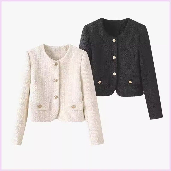 Chic women's short jacket featuring elegant design and striking gold buttons for a refined look.