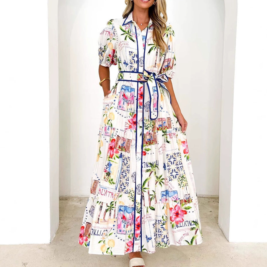 Women's airy maxi dress with vibrant floral graphic design, flowy fabric & practical side pockets. Perfect summer comfort.