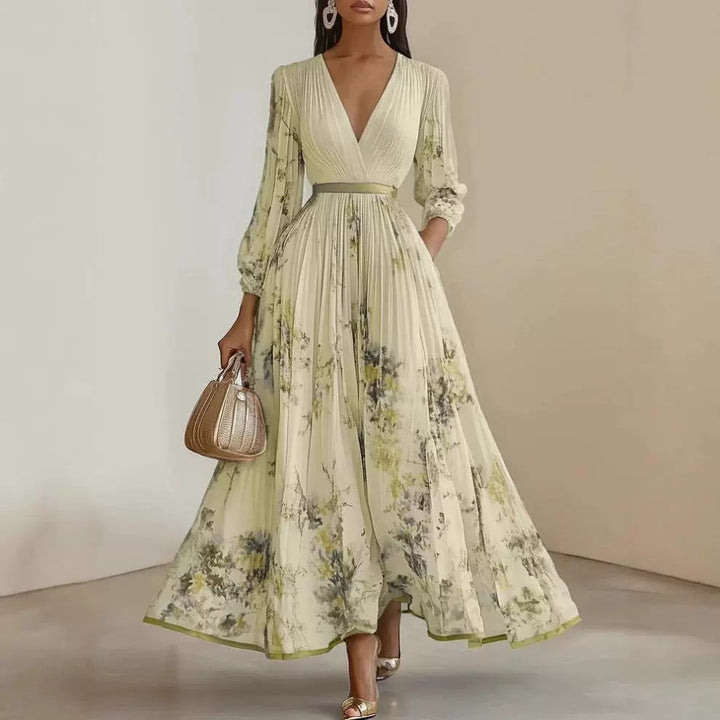 Romantic long sleeve floral maxi dress with V-neck and puffed sleeves, a stylish choice for spring & summer events.