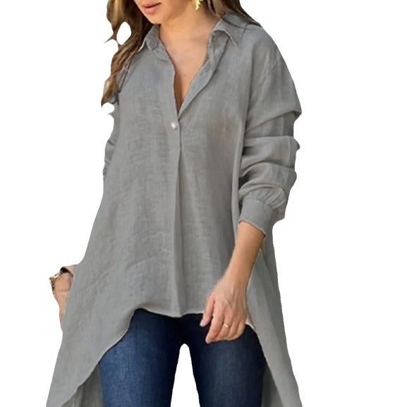 Relaxed fit women's white long blouse, comfortable button-down for casual summer fashion.