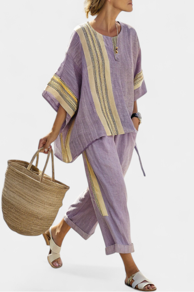 Women's chic striped top and matching pants set for a coordinated and trendy summer look.