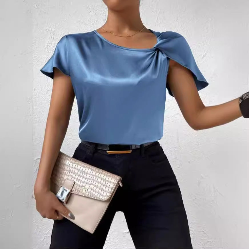 Elegant commuter women's solid t-shirt top. Chic round neck, versatile short sleeves & twist detail.