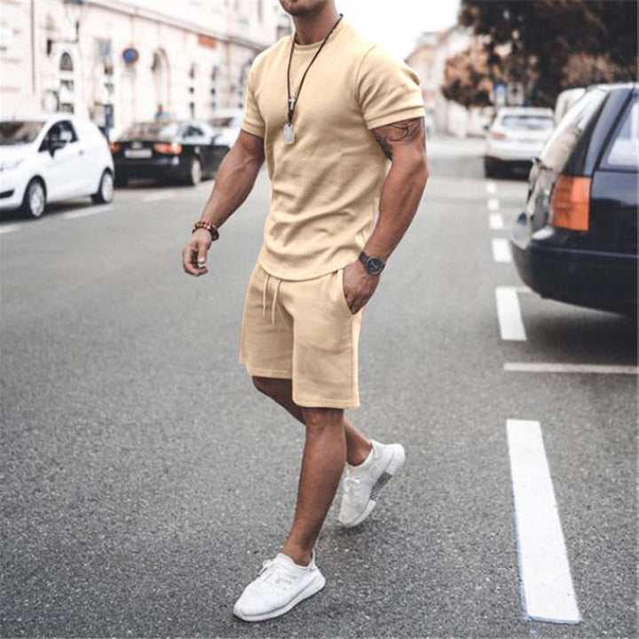 Versatile men's summer outfit: breathable t-shirt and shorts for active lifestyles.