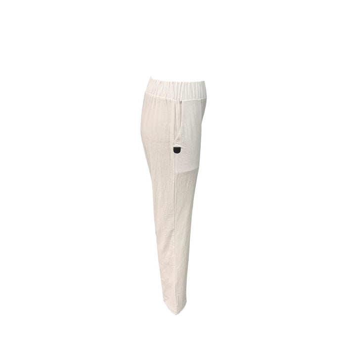 Flowy wide leg women's cropped pants. Relaxed fit elastic waist summer bottoms, ideal for comfort.