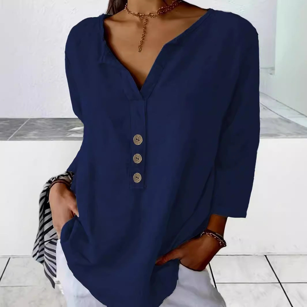 Comfortable women's v-neck button-down blouse, 3/4 sleeve. Perfect loose casual top for stylish everyday wear.