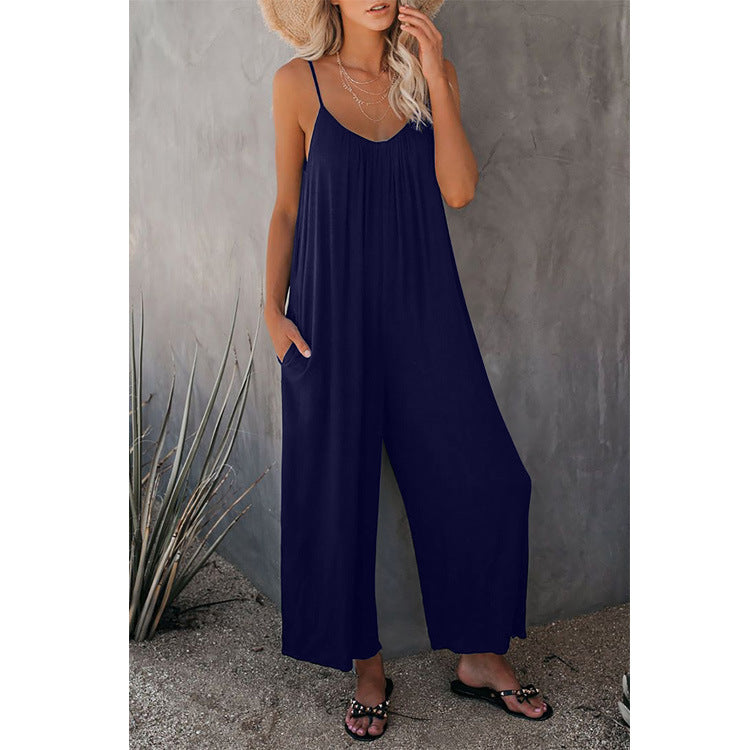 Plunging neckline women's jumpsuit with practical pockets, ideal one-piece outfit for summer chic.
