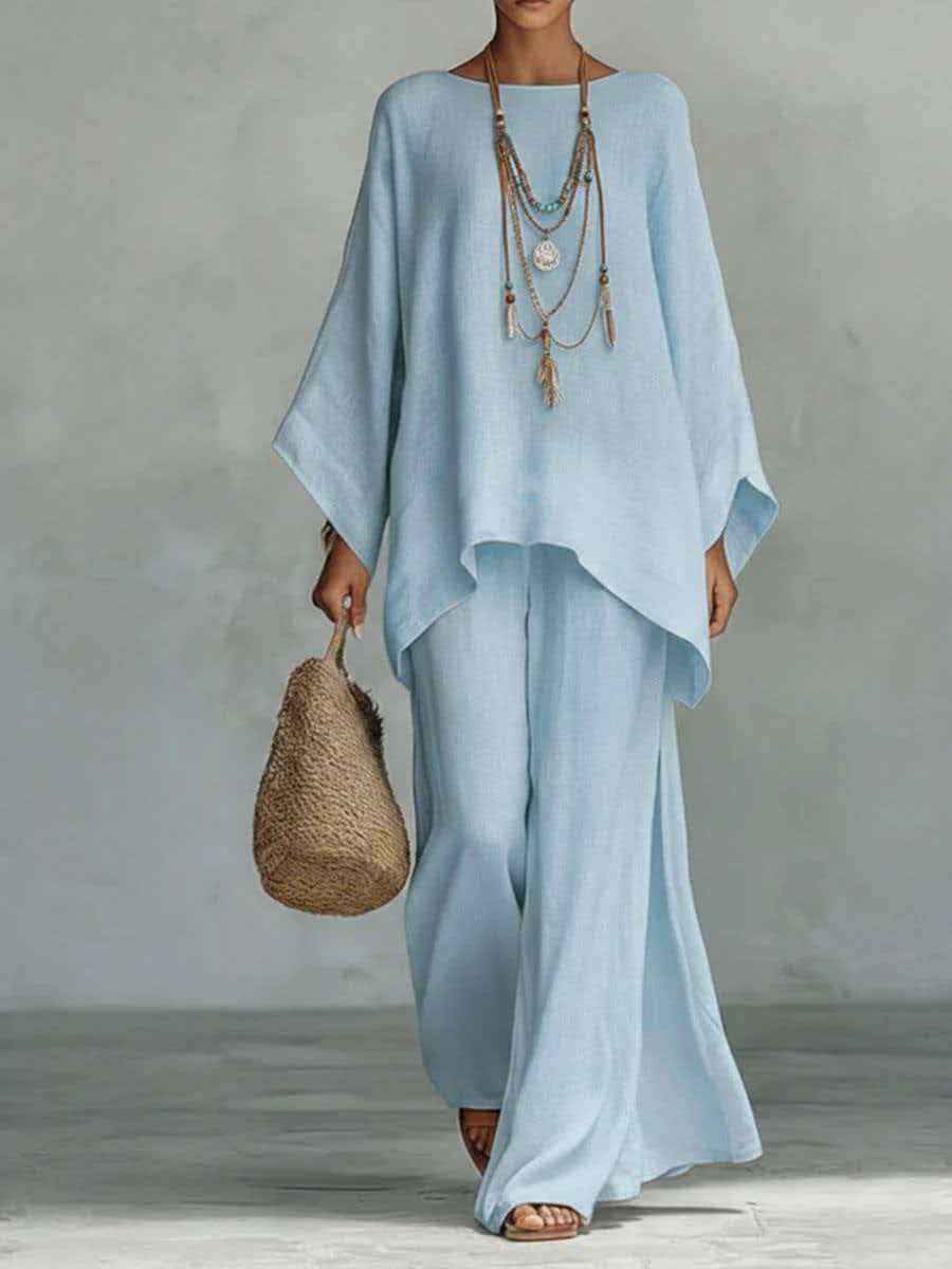 Relaxed women's loose fit two-piece outfit with wide leg pants, offering soft comfort for daily wear.