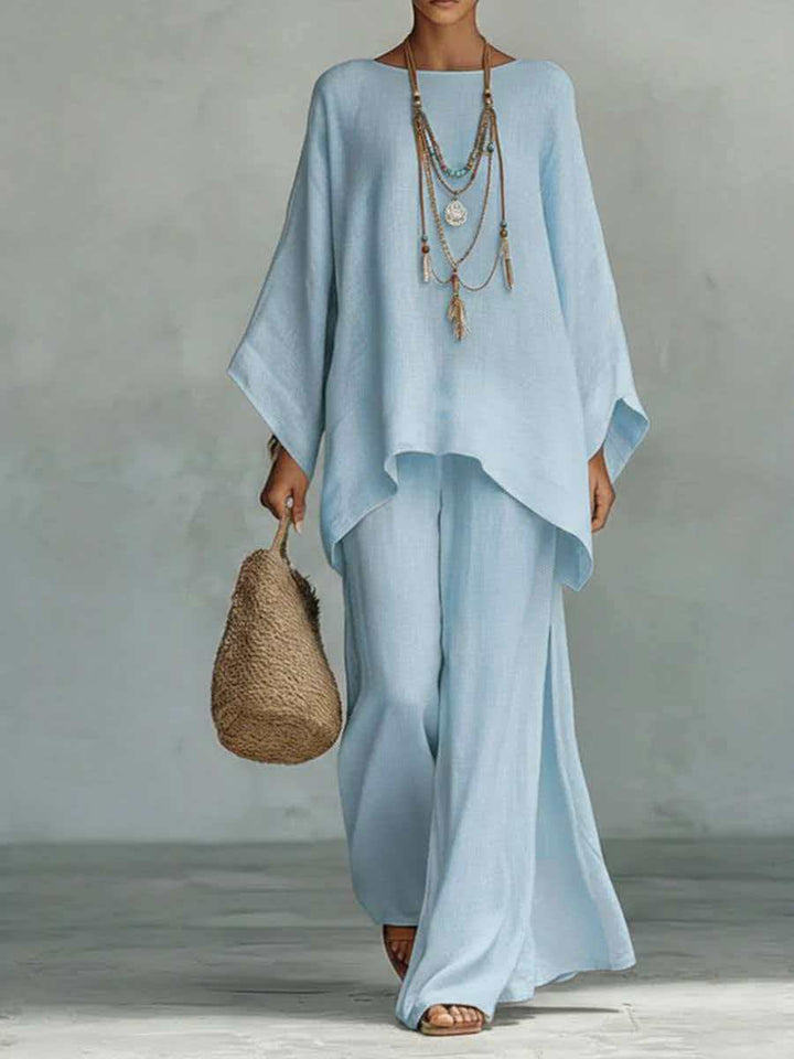 Relaxed women's loose fit two-piece outfit with wide leg pants, offering soft comfort for daily wear.