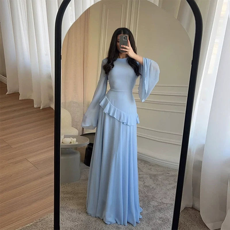 Women's elegant tiered gala maxi dress with flowing bell sleeves, perfect for formal events.