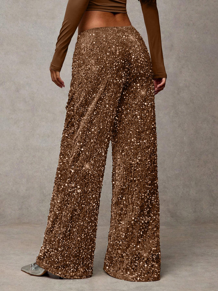 Chic sequin palazzo pants, comfortable high-waist wide-leg design for versatile party outfits.