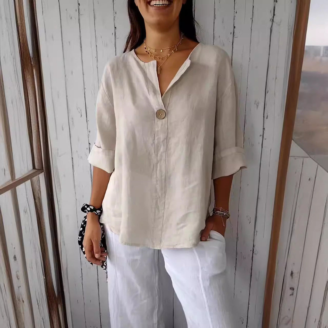 Women's airy button-front blouse, perfect for casual summer style. Comfortable, relaxed fit.