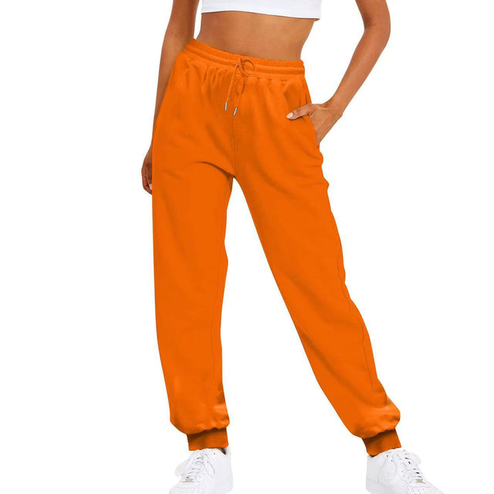 Ultra-comfortable women's joggers, elastic waist, side pockets. Versatile for home, gym, or errands.
